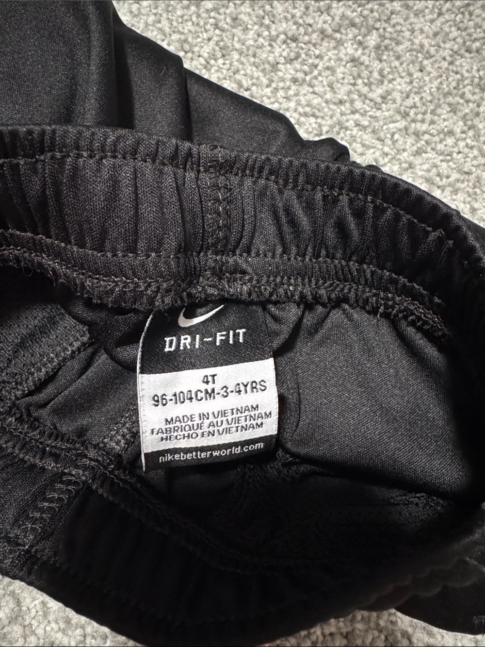 Nike Black Kids Shorts with White Swoosh Accent - Picture 2 of 2